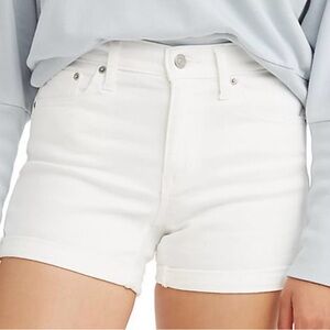 Levi’s white distressed jean shorts